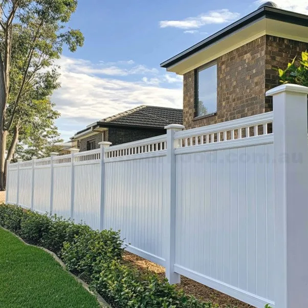 White PVC fence along a residential boundary